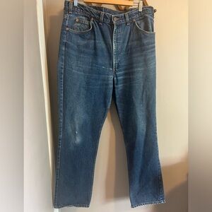Levi’s orange tab vintage jeans eclectic grandpa look has some distressing.